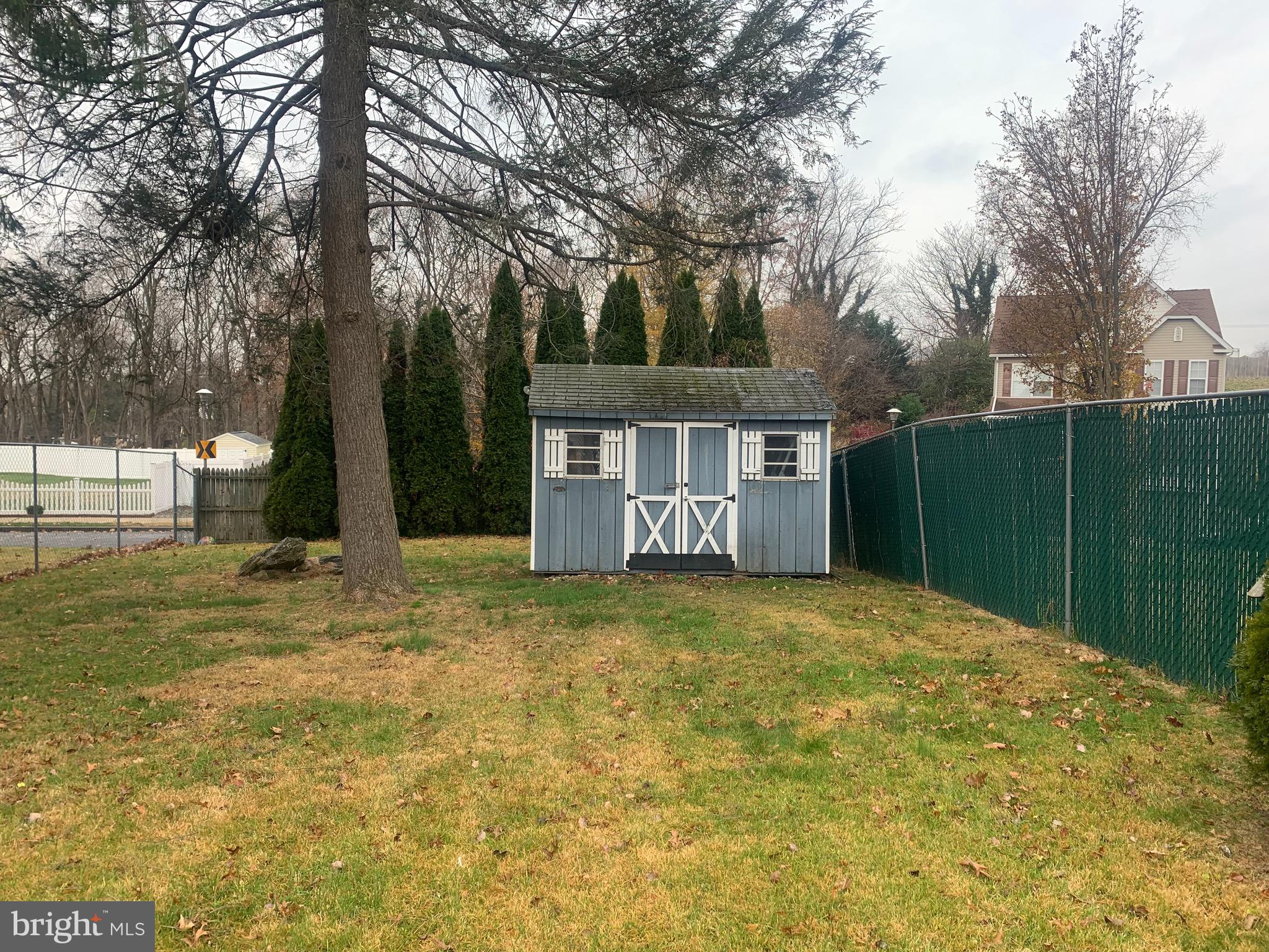 9902 Medway Road Philadelphia, PA 19115 - Photo 25 of 28 a view of a house with backyard and trees