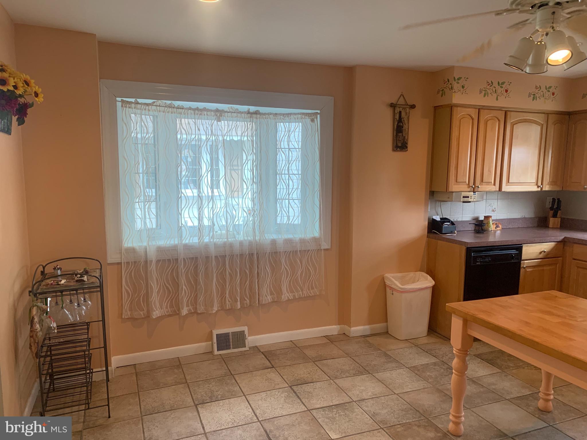 9902 Medway Road Philadelphia, PA 19115 - Photo 5 of 28 a kitchen with a sink and cabinets
