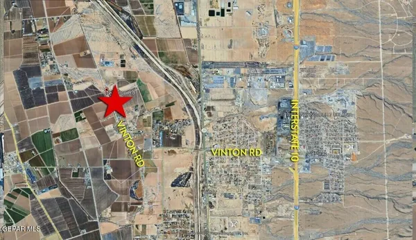 a aerial view of multi story residential apartment building with entryway