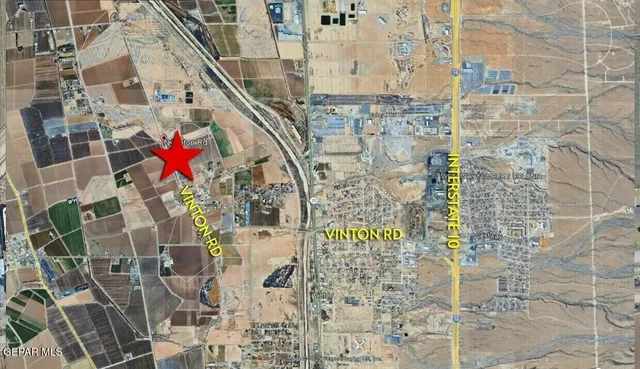 a aerial view of multi story residential apartment building with entryway