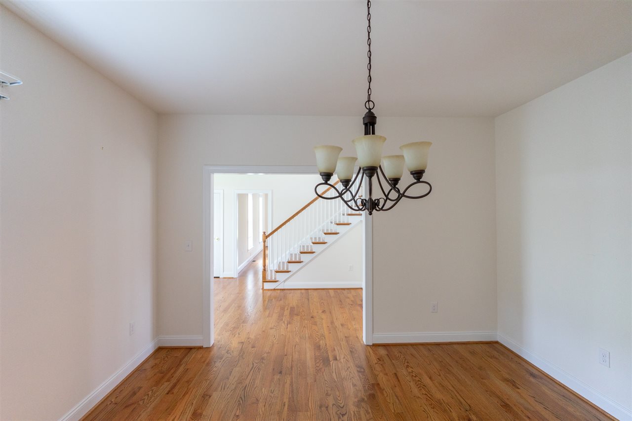 3439 Barterbrook Road Staunton, VA 24401 - Photo 5 of 39 a view of a hallway with wooden floor and staircase