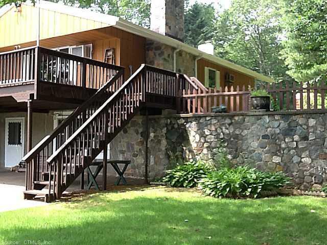 77 Homestead Road Ledyard, CT 06339 - Photo 1 of 1 a view of backyard with deck and garden
