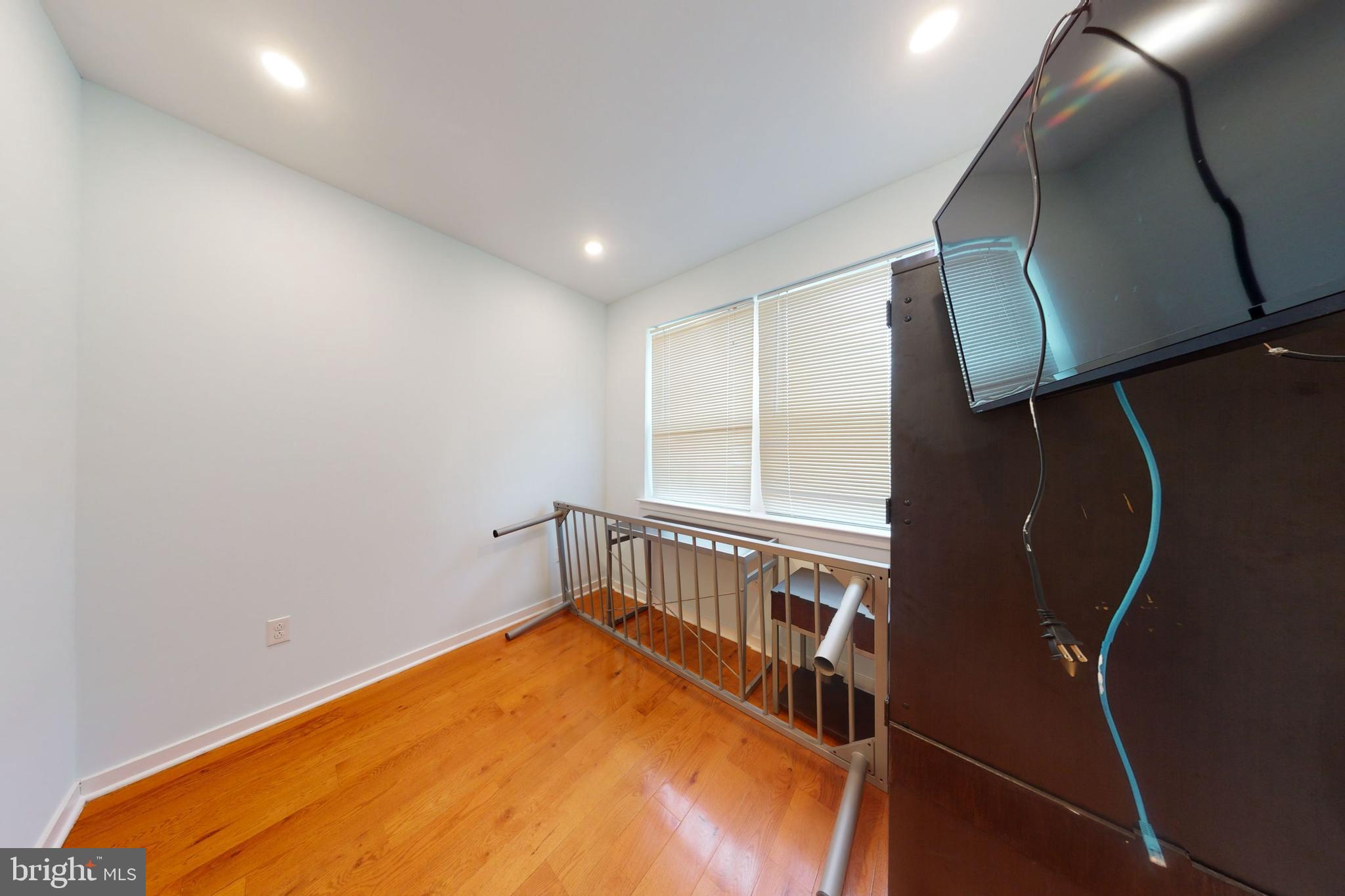 1517 West Seybert Street, Unit 1 Philadelphia, PA 19121 - Photo 4 of 5 a view of an empty room with windows