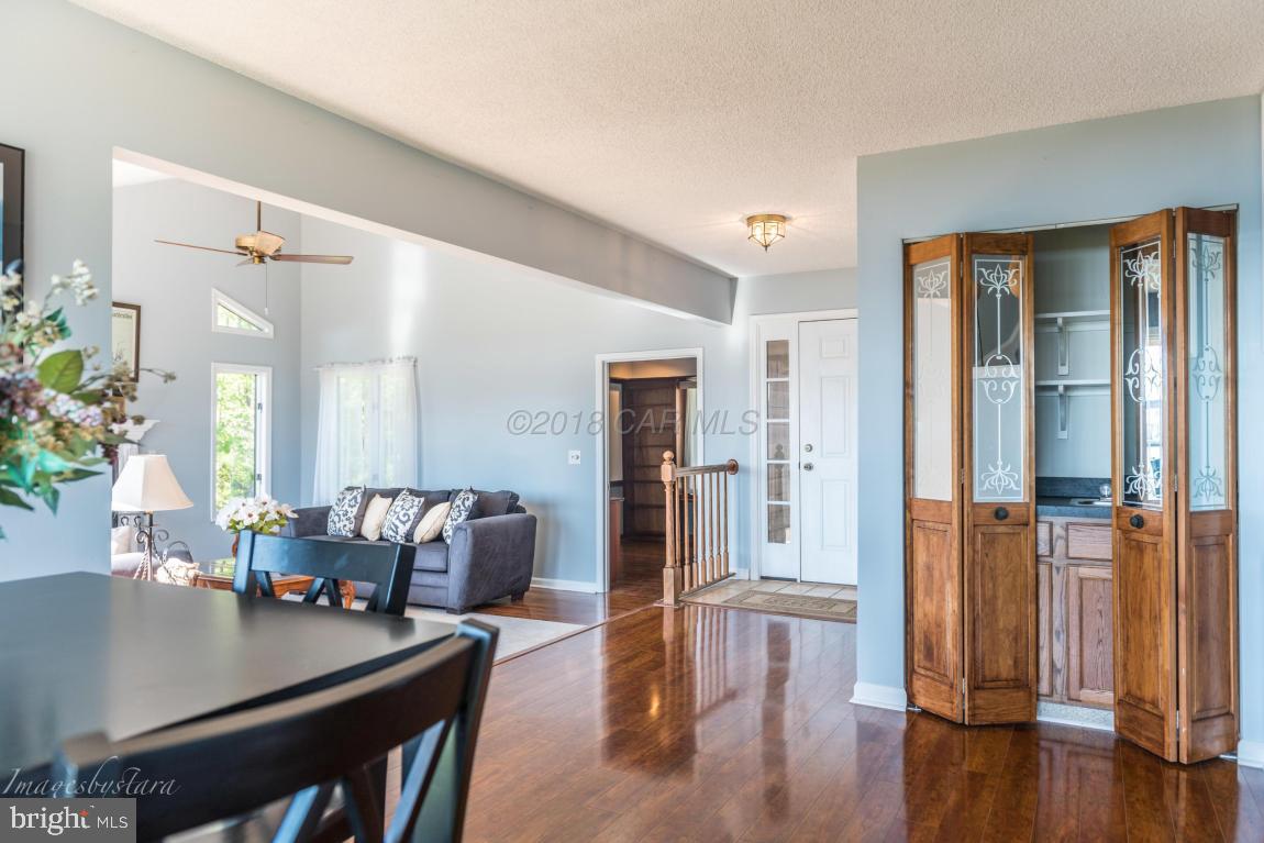 36 Saltgrass Road Ocean Pines, MD 21811 - Photo 17 of 70 a living room with furniture and wooden floor