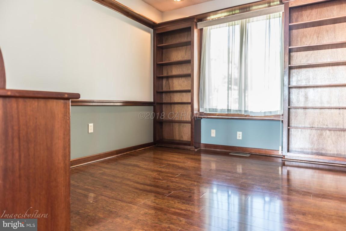 36 Saltgrass Road Ocean Pines, MD 21811 - Photo 18 of 70 a view of a room with wooden floor and a window