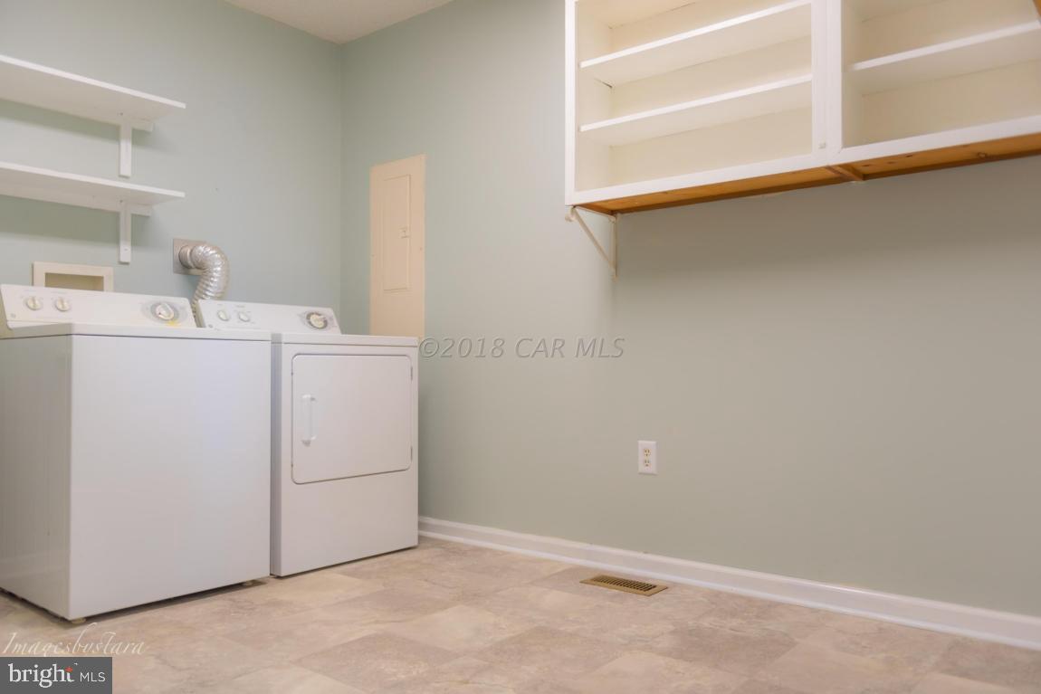 36 Saltgrass Road Ocean Pines, MD 21811 - Photo 29 of 70 a utility room with dryer and washer