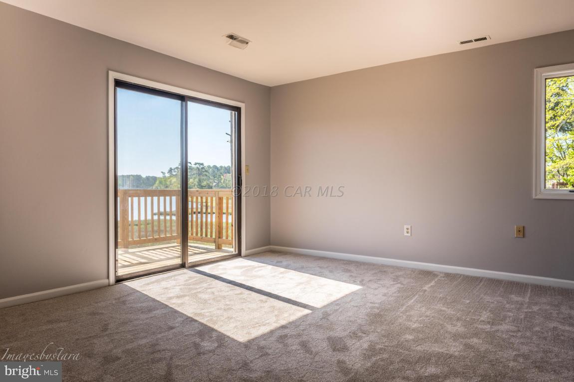 36 Saltgrass Road Ocean Pines, MD 21811 - Photo 43 of 70 a view of an empty room with a window