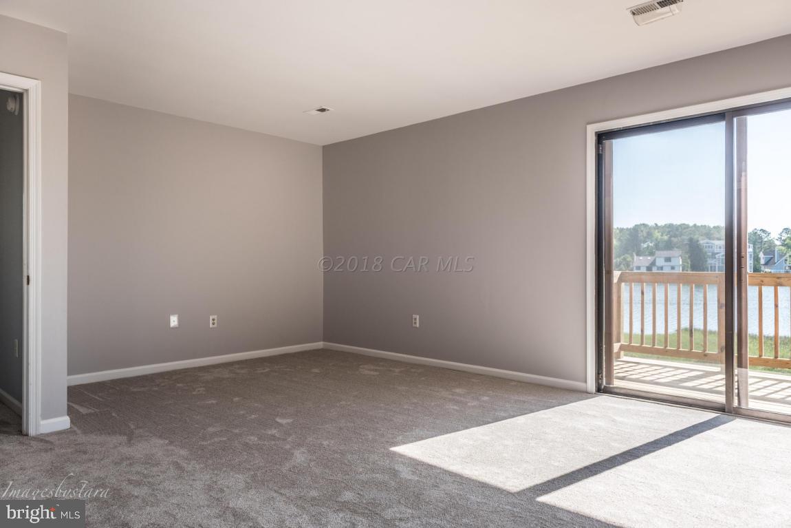 36 Saltgrass Road Ocean Pines, MD 21811 - Photo 44 of 70 a view of an empty room with a window