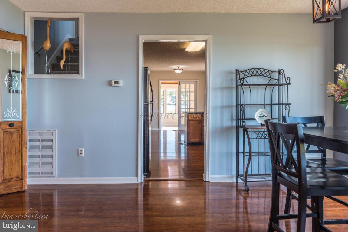 36 Saltgrass Road Ocean Pines, MD 21811 - Photo 54 of 70 a view of a livingroom with furniture and hardwood floor