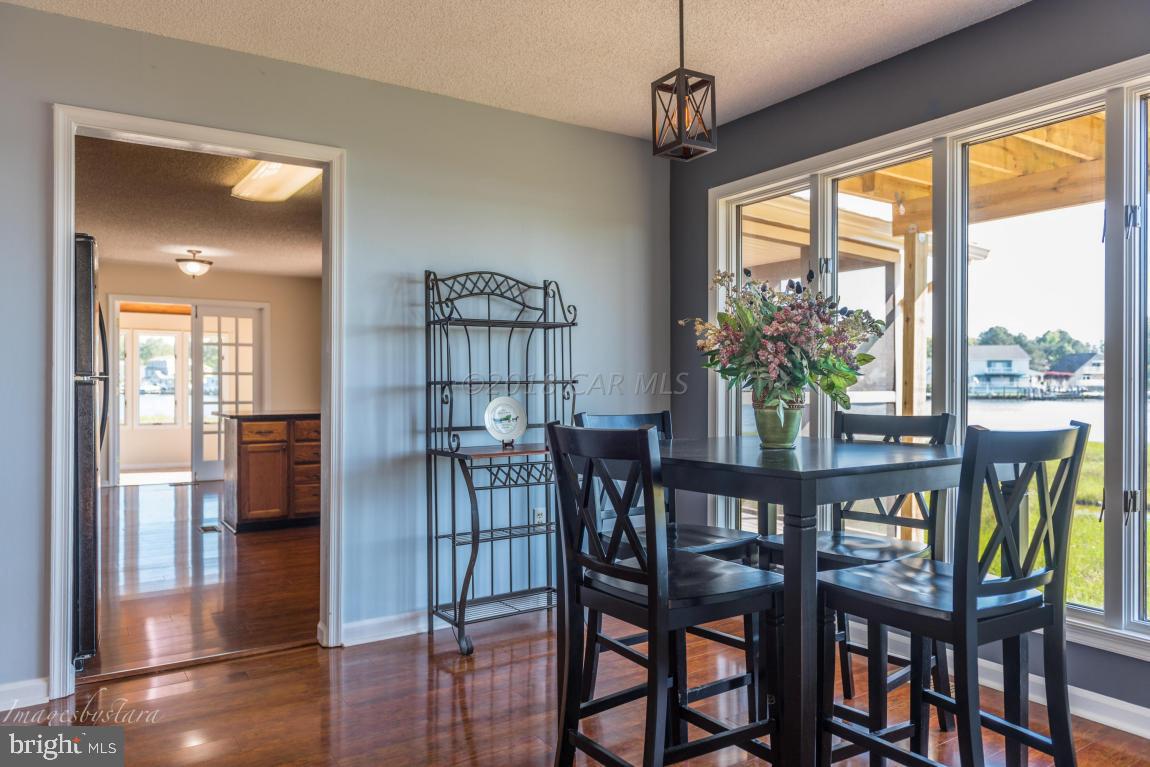36 Saltgrass Road Ocean Pines, MD 21811 - Photo 55 of 70 a dining room with furniture and window
