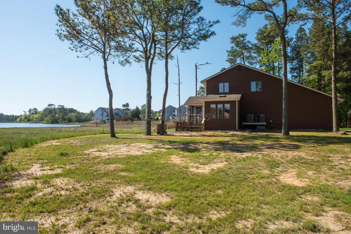 36 Saltgrass Road Ocean Pines, MD 21811 - Photo 59 of 70 a view of a house with a swimming pool
