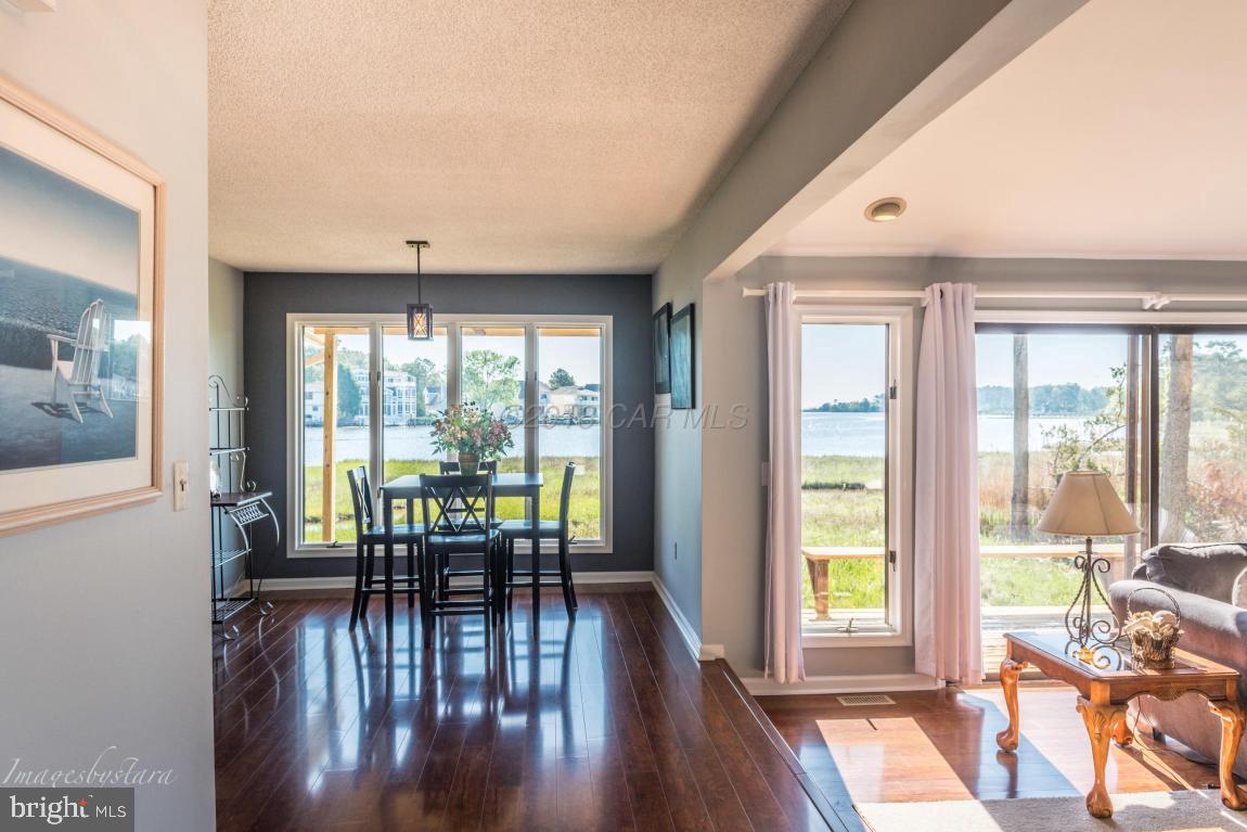 36 Saltgrass Road Ocean Pines, MD 21811 - Photo 7 of 70 a view of a dining room with furniture window and wooden floor