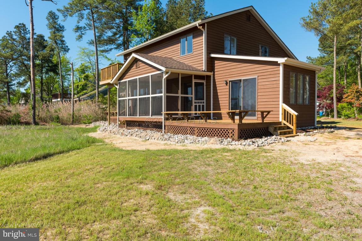 36 Saltgrass Road Ocean Pines, MD 21811 - Photo 63 of 70 a view of a house with backyard and sitting area