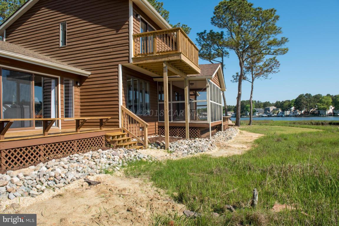 36 Saltgrass Road Ocean Pines, MD 21811 - Photo 67 of 70 front view of a house with a yard