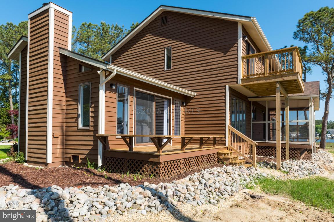 36 Saltgrass Road Ocean Pines, MD 21811 - Photo 68 of 70 a front view of a house with garden