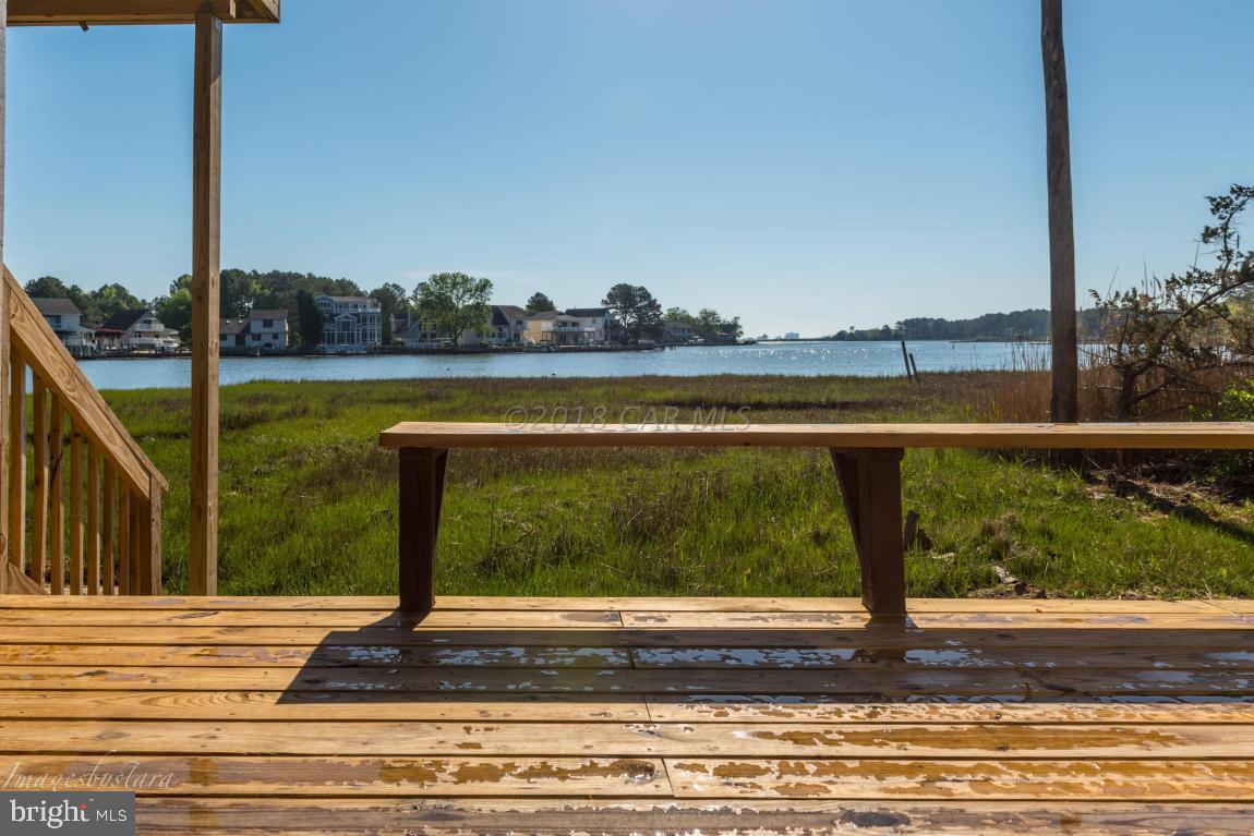 36 Saltgrass Road Ocean Pines, MD 21811 - Photo 10 of 70 a view of a swimming pool with a balcony