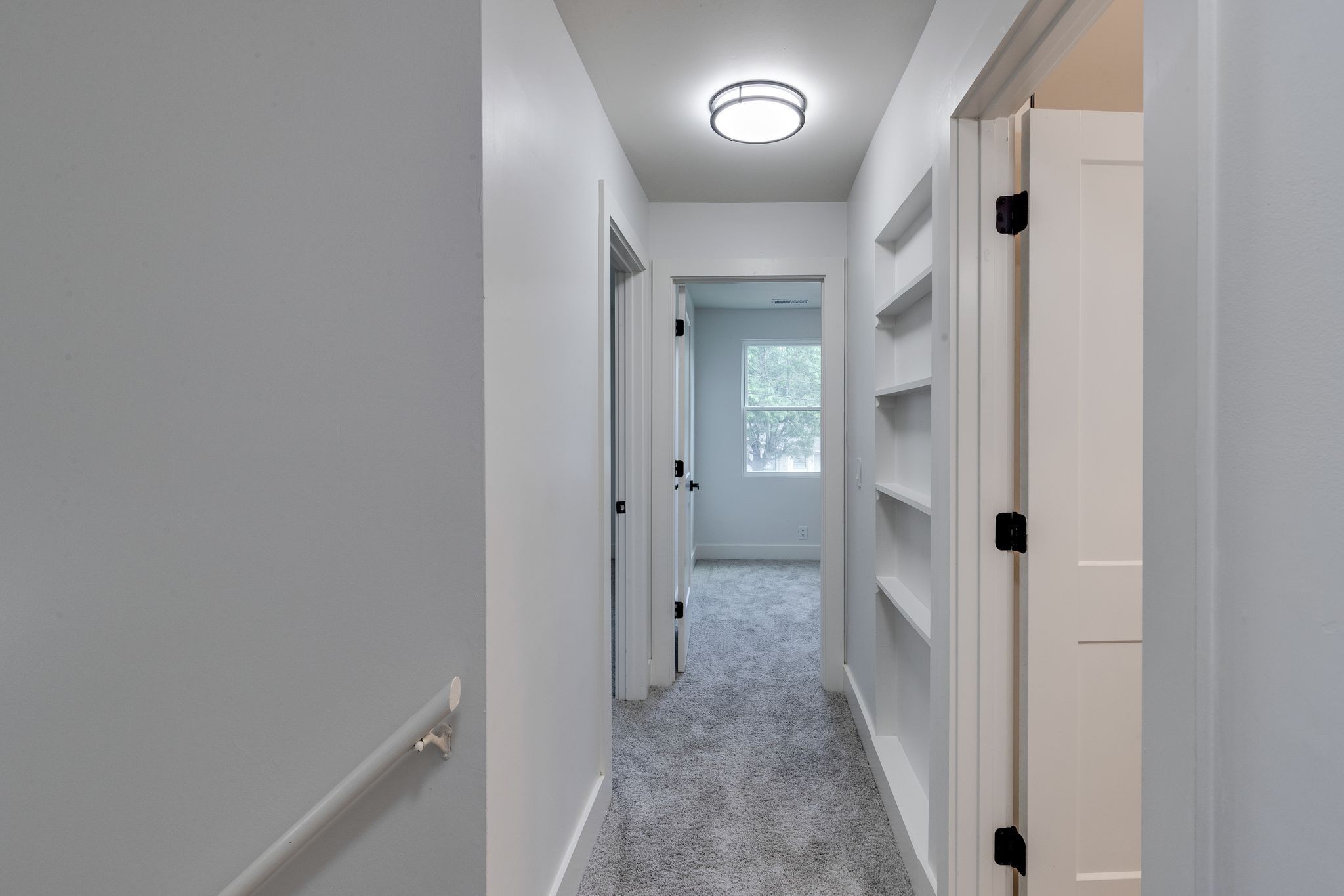 634 North 5th Street Nashville, TN 37207 - Photo 11 of 27 wooden floor with a hallway