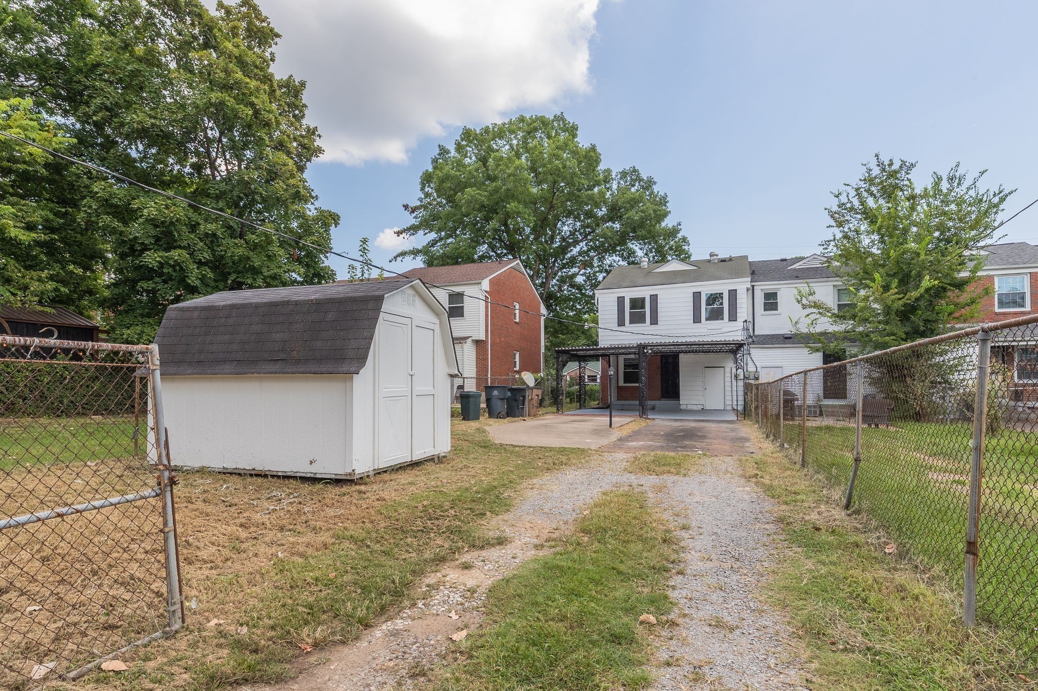 634 North 5th Street Nashville, TN 37207 - Photo 25 of 27 a view of a house with a yard and sitting area