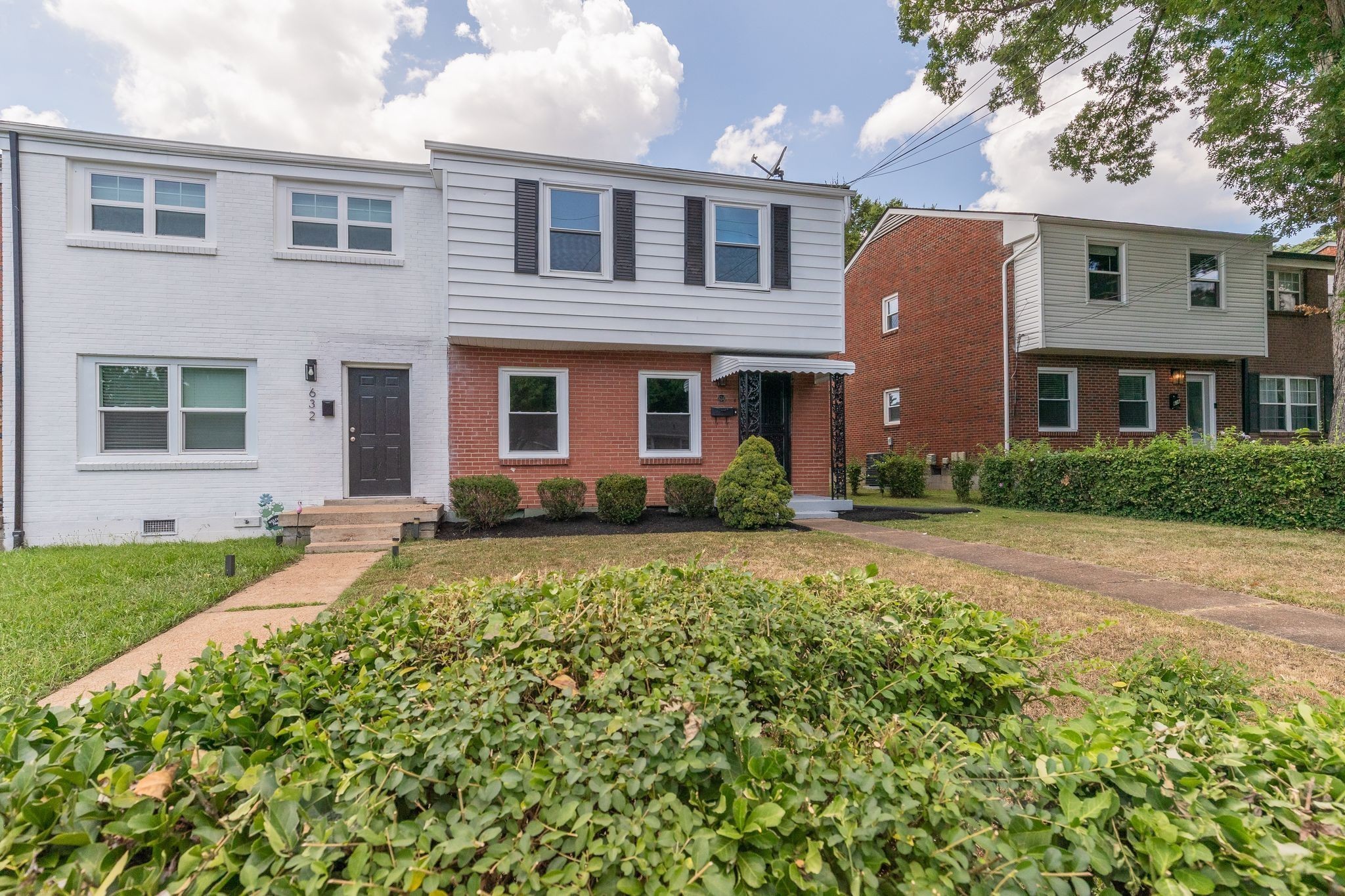 634 North 5th Street Nashville, TN 37207 - Photo 26 of 27 a front view of a house with a yard