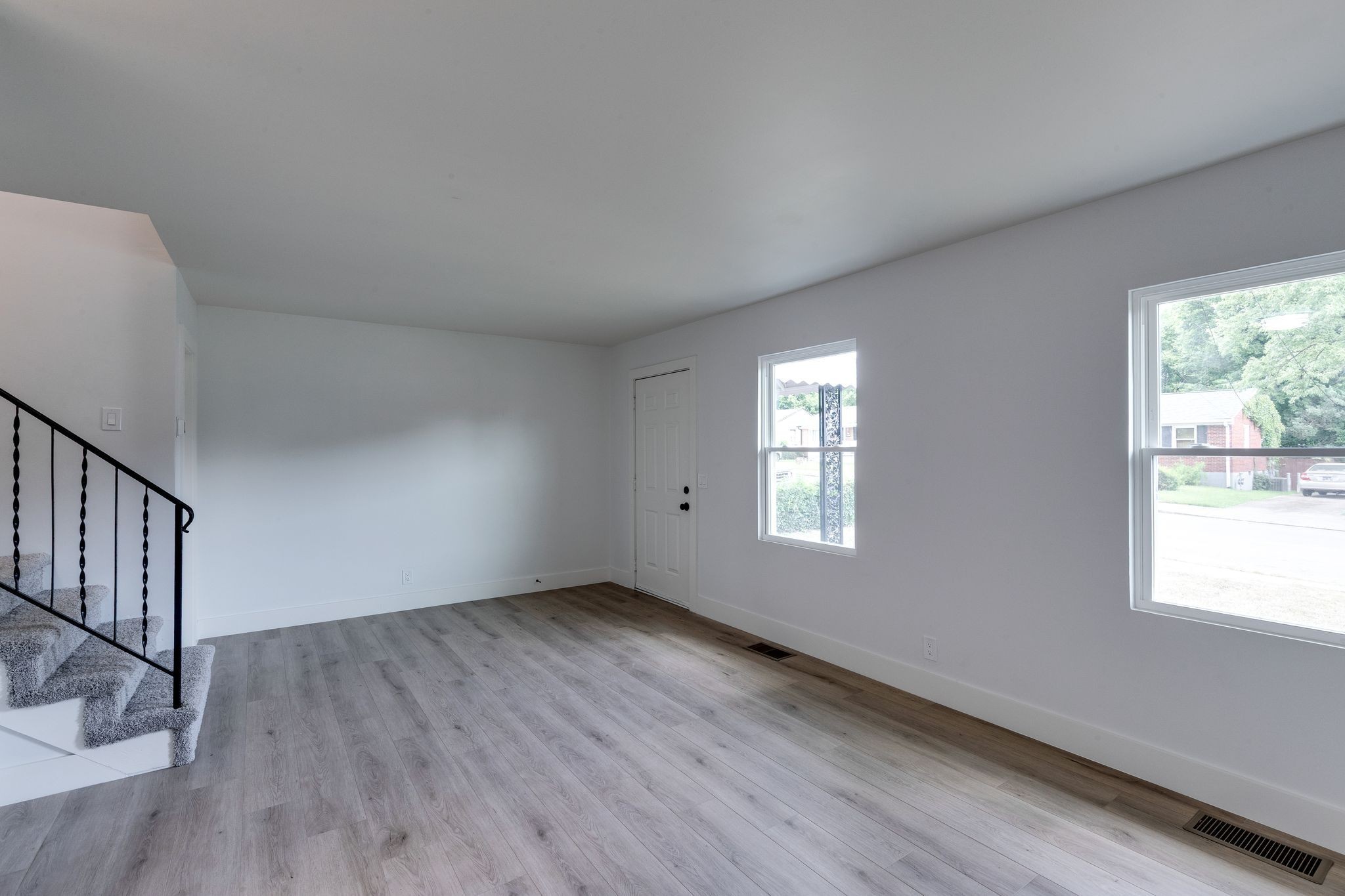 634 North 5th Street Nashville, TN 37207 - Photo 4 of 27 a view of an empty room with wooden floor and a window