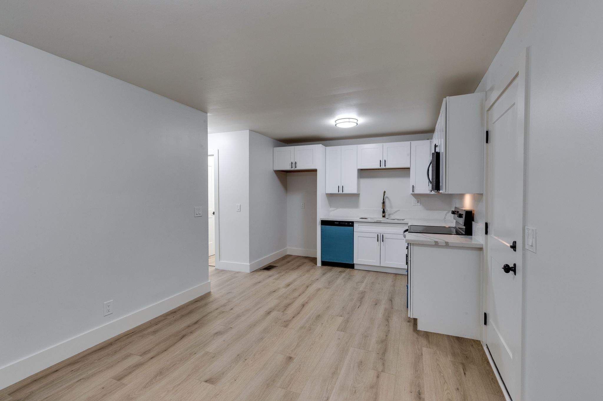 634 North 5th Street Nashville, TN 37207 - Photo 8 of 27 a kitchen with stainless steel appliances granite countertop a stove a sink and a refrigerator