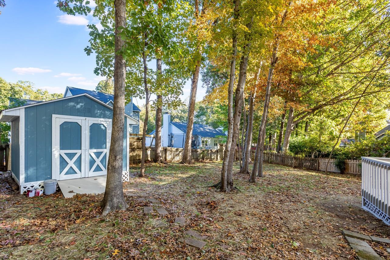 2809 Hiking Trail Raleigh, NC 27615 - Photo 28 of 28 Make sure to tour this newly stained shed...could be the perfect he/she Shed! Shed