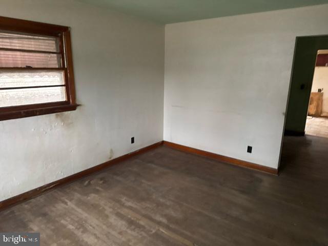 2441 Alder Street Norfolk, VA 23513 - Photo 7 of 11 a view of an empty room and wooden floor