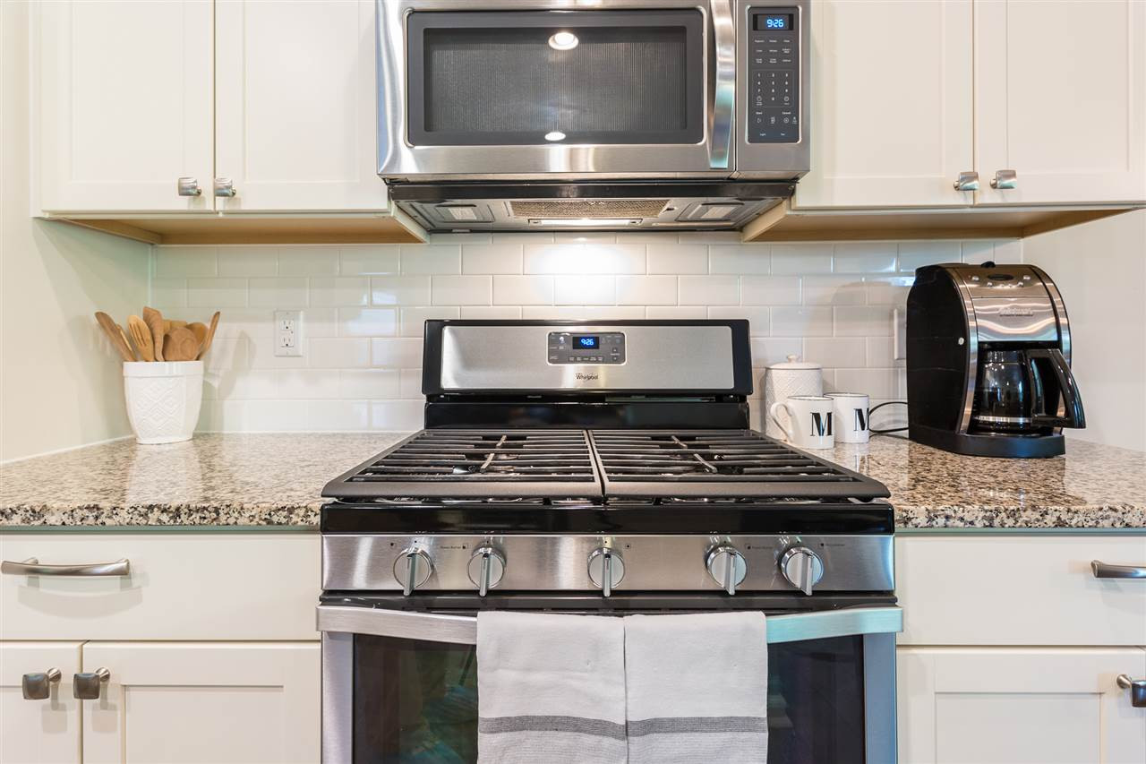 8139 Feldwig Place Raleigh, NC 27616 - Photo 15 of 30 Gas Range and Microwave