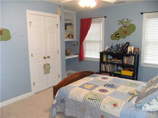 9405 Stone Mountain Road Raleigh, NC 27613 - Photo 8 of 12 Guest bedroom with great closet and desk area.