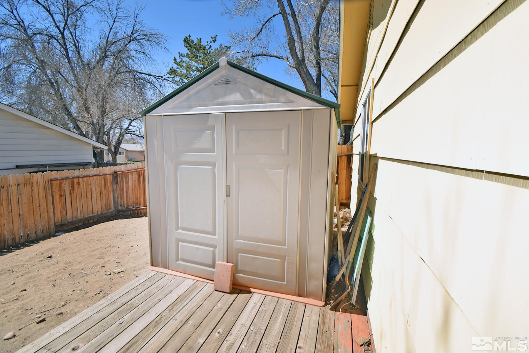 1848 Matteoni Drive Sparks, NV 89434 - Photo 21 of 34 a view of a house with a wooden deck