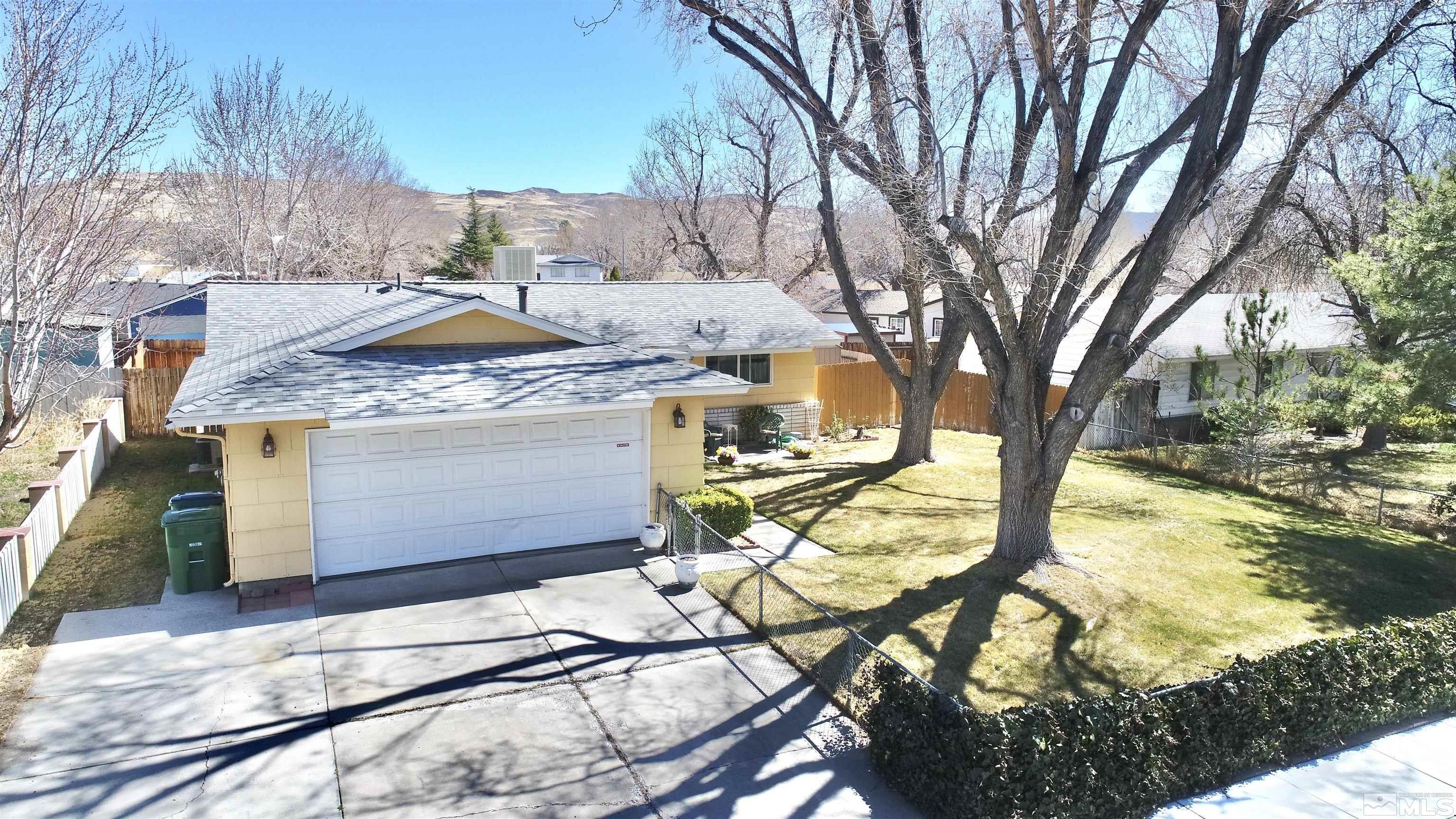 1848 Matteoni Drive Sparks, NV 89434 - Photo 27 of 34 a view of a house with backyard and sitting area