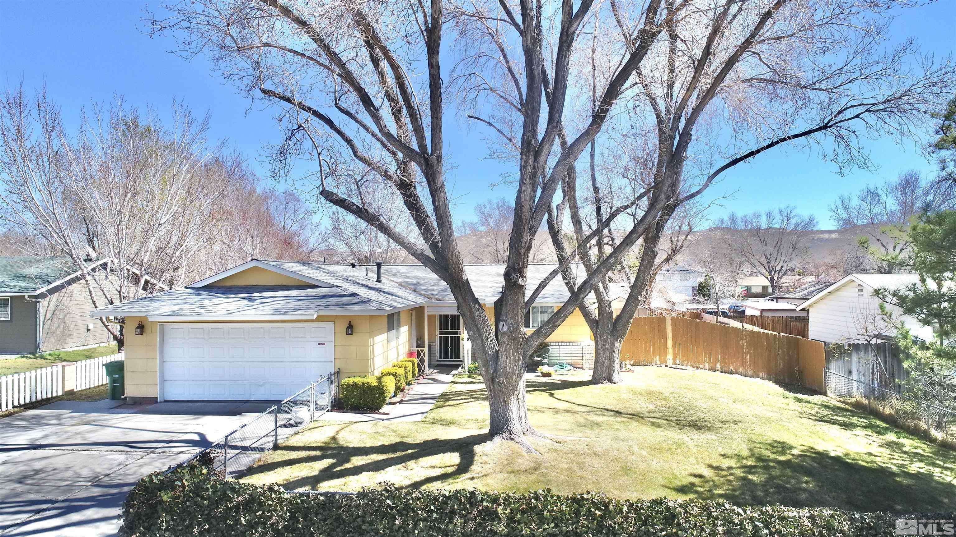 1848 Matteoni Drive Sparks, NV 89434 - Photo 28 of 34 a view of a house with snow on the side of the house