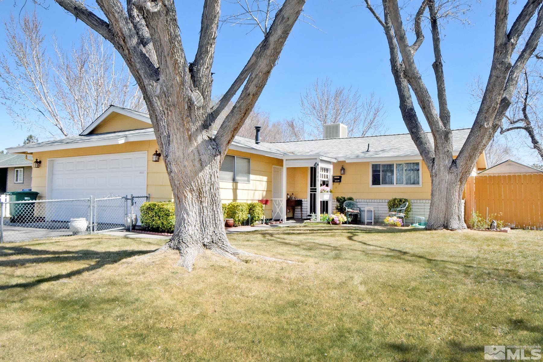 1848 Matteoni Drive Sparks, NV 89434 - Photo 30 of 34 a view of a house with center and large trees