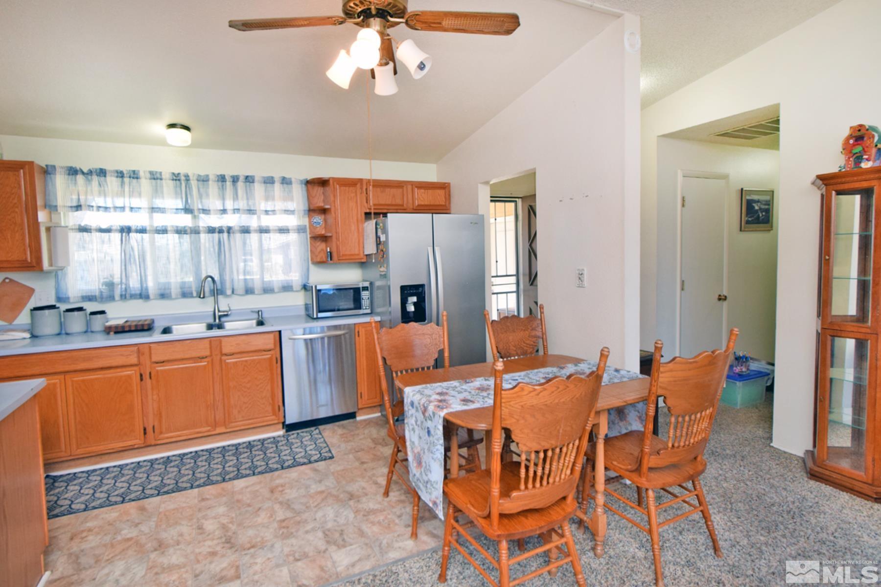 1848 Matteoni Drive Sparks, NV 89434 - Photo 6 of 34 a view of a dining room with furniture window and wooden floor