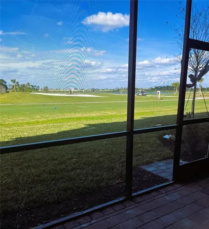 a view of swimming pool from a balcony