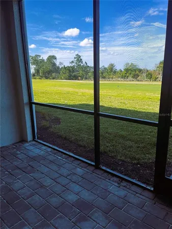 a view of a room next to a large window