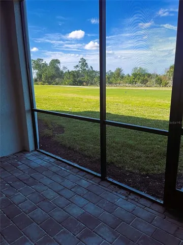 a view of a room next to a large window