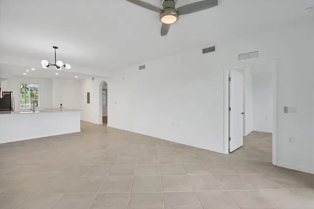 a view of a livingroom with a kitchen
