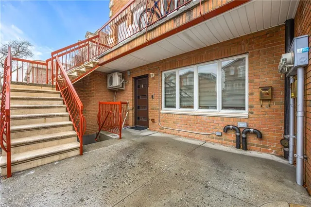 a view of a house with a large window