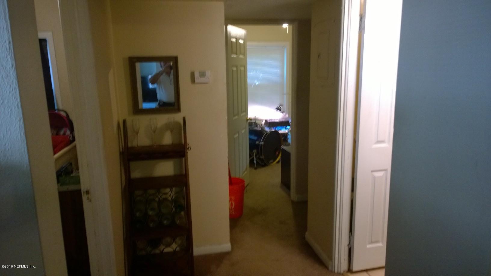 9842 Buncome Road Jacksonville, FL 32246 - Photo 15 of 17 Hallway to bedrooms