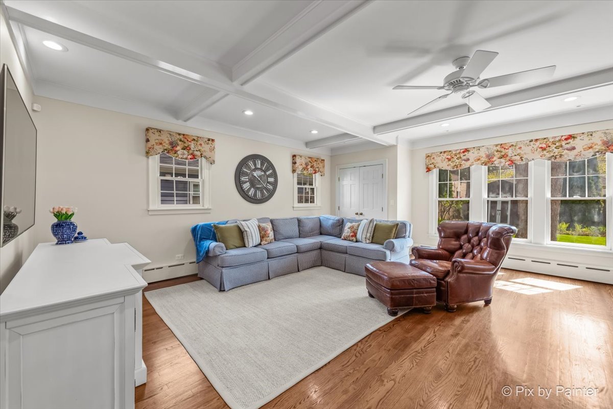 705 Hunter Road Glenview, IL 60025 - Photo 15 of 51 a living room with furniture and a large window
