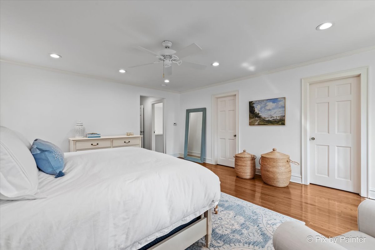 705 Hunter Road Glenview, IL 60025 - Photo 19 of 51 a bedroom with a bed and a couch