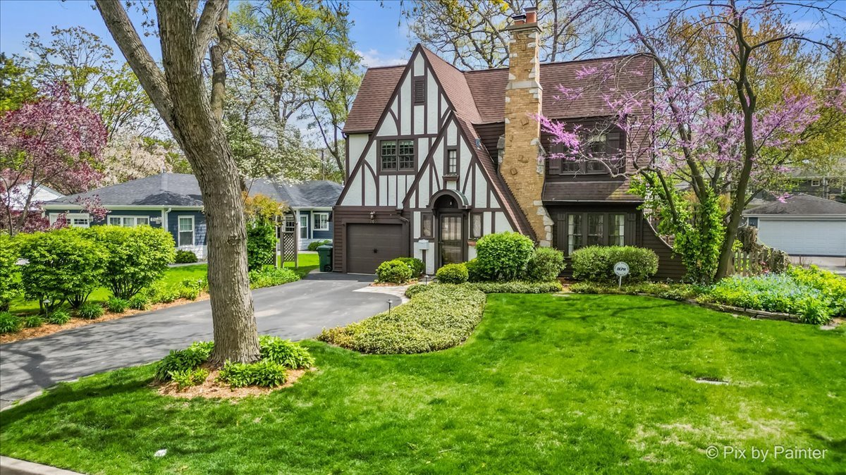 705 Hunter Road Glenview, IL 60025 - Photo 50 of 51 a view of a house with a yard and plants