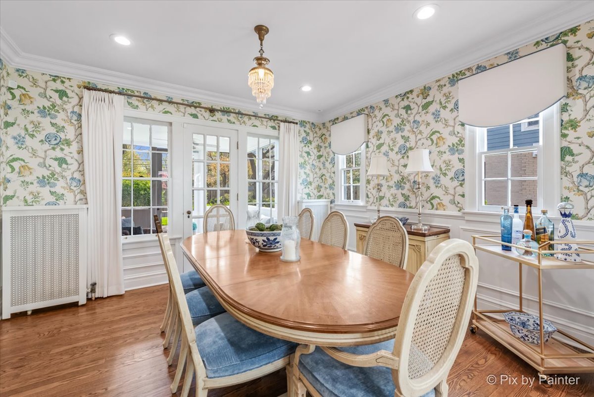 705 Hunter Road Glenview, IL 60025 - Photo 10 of 51 a dining room with furniture window and wooden floor