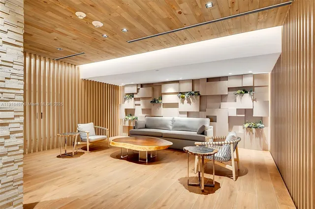 a kitchen with sink and refrigerator