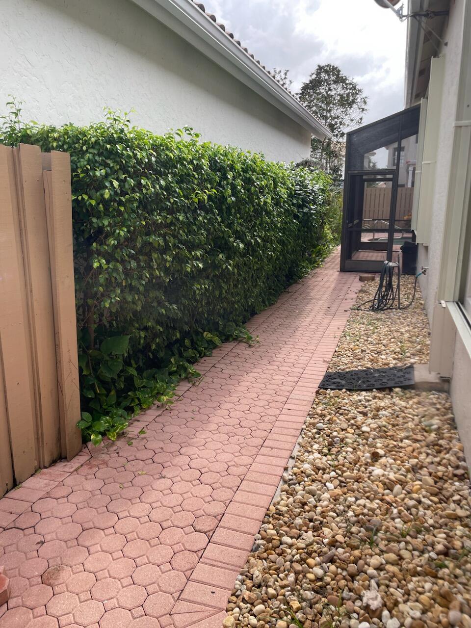 6675 Northwest 25th Way Boca Raton, FL 33496 - Photo 13 of 61 Walkway to pool