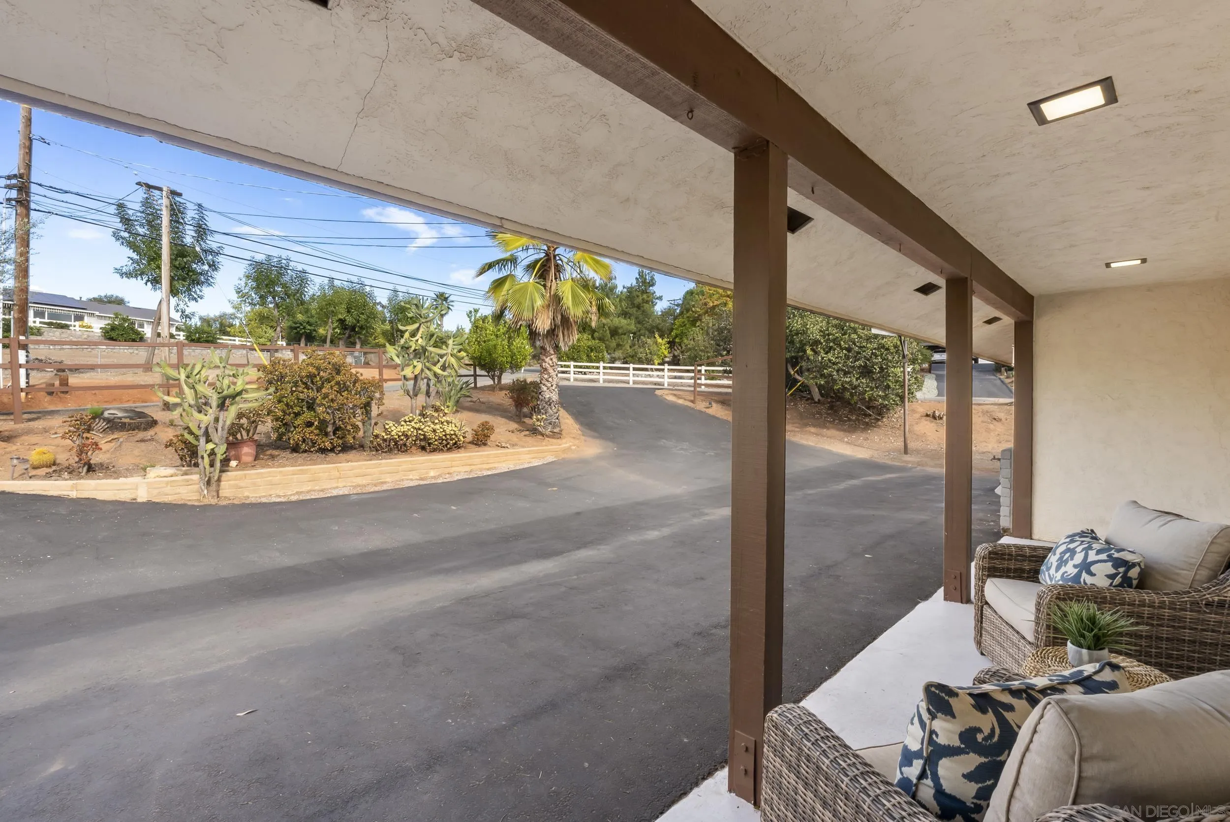 1429 Midway Drive Alpine, CA 91901 - Photo 11 of 42 a room with furniture and a potted plant