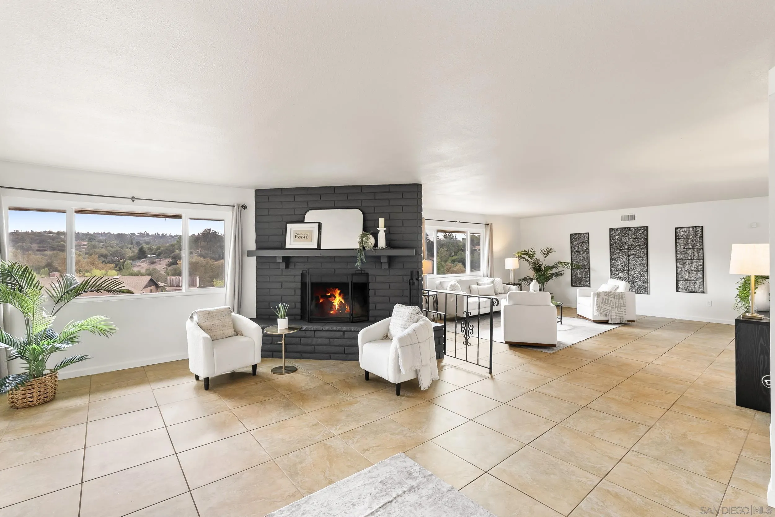 1429 Midway Drive Alpine, CA 91901 - Photo 16 of 42 a living room with furniture and a fireplace