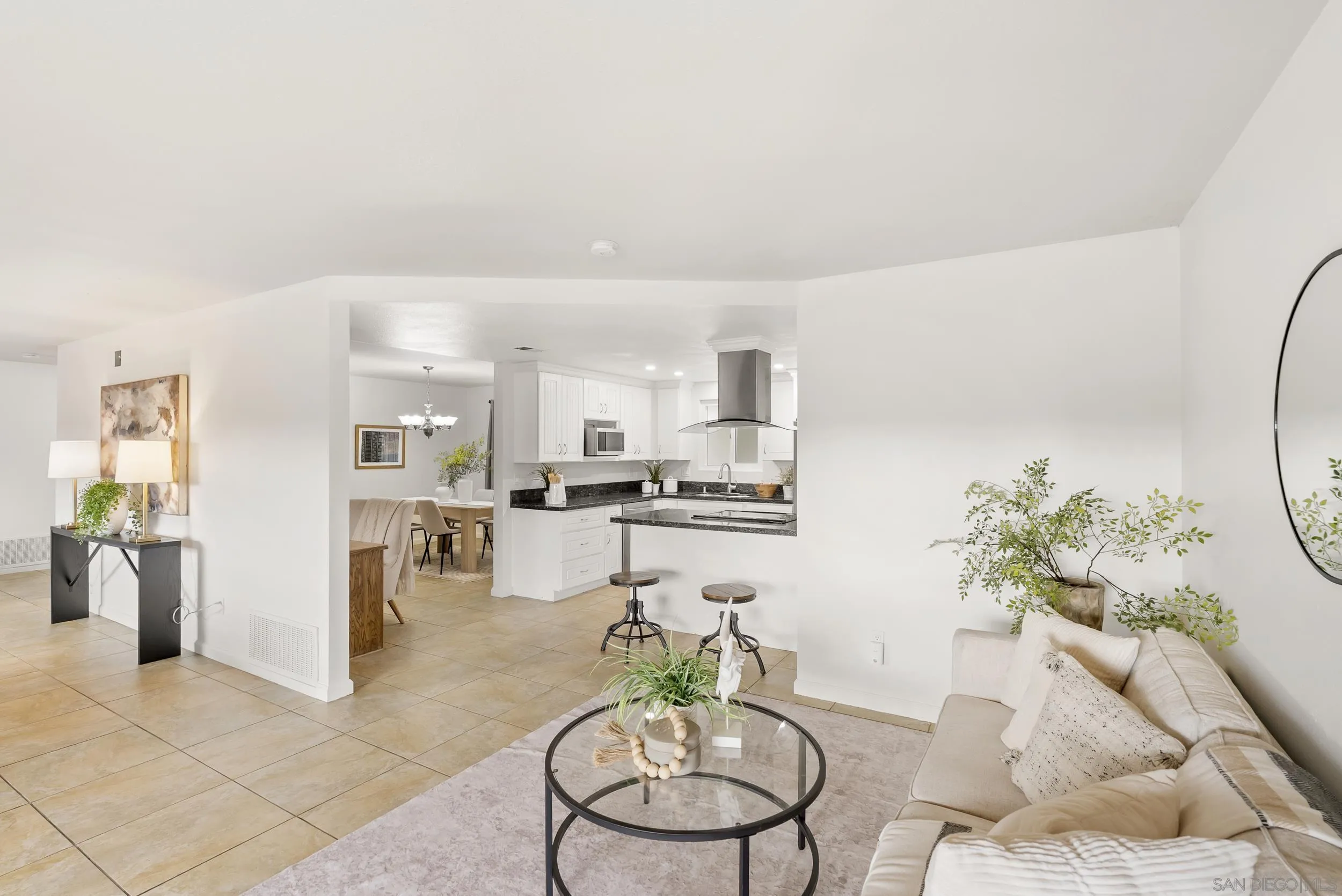 1429 Midway Drive Alpine, CA 91901 - Photo 19 of 42 a living room with furniture kitchen and a chandelier