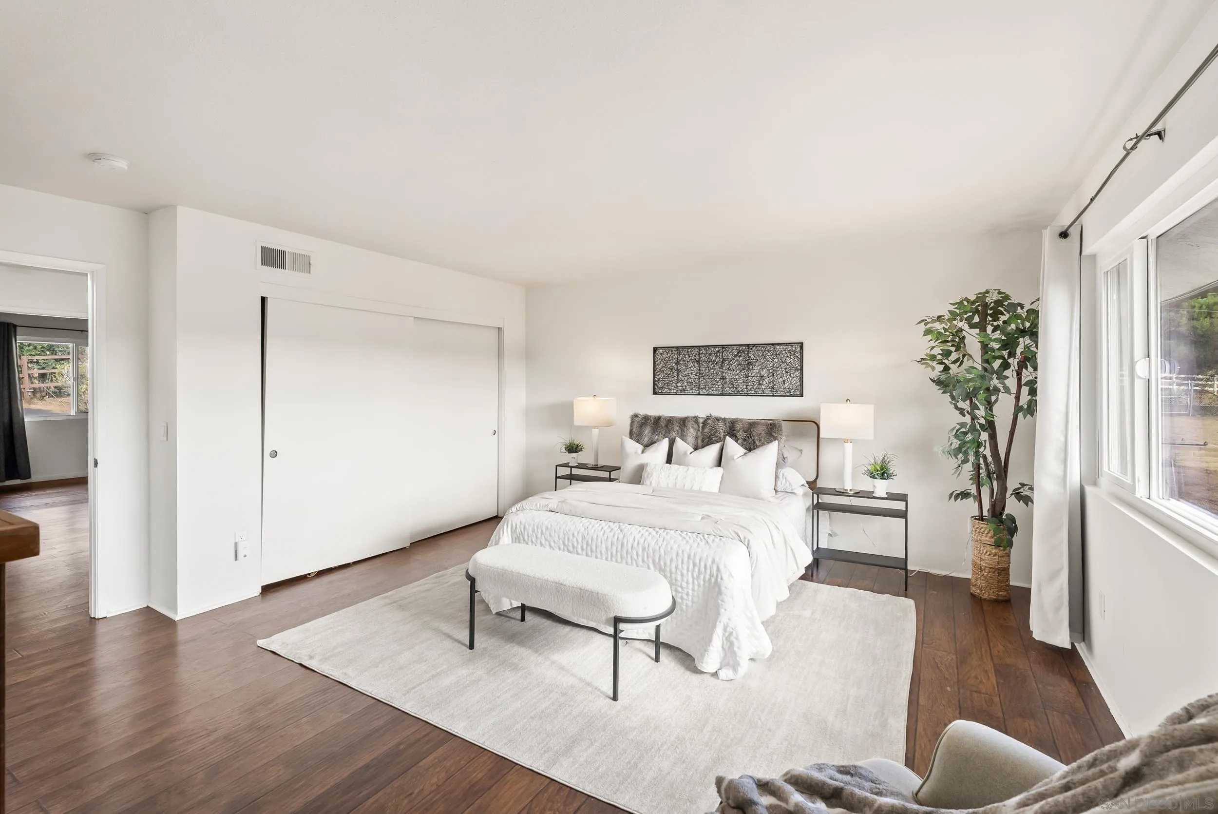 1429 Midway Drive Alpine, CA 91901 - Photo 28 of 42 a bedroom with a bed and a table